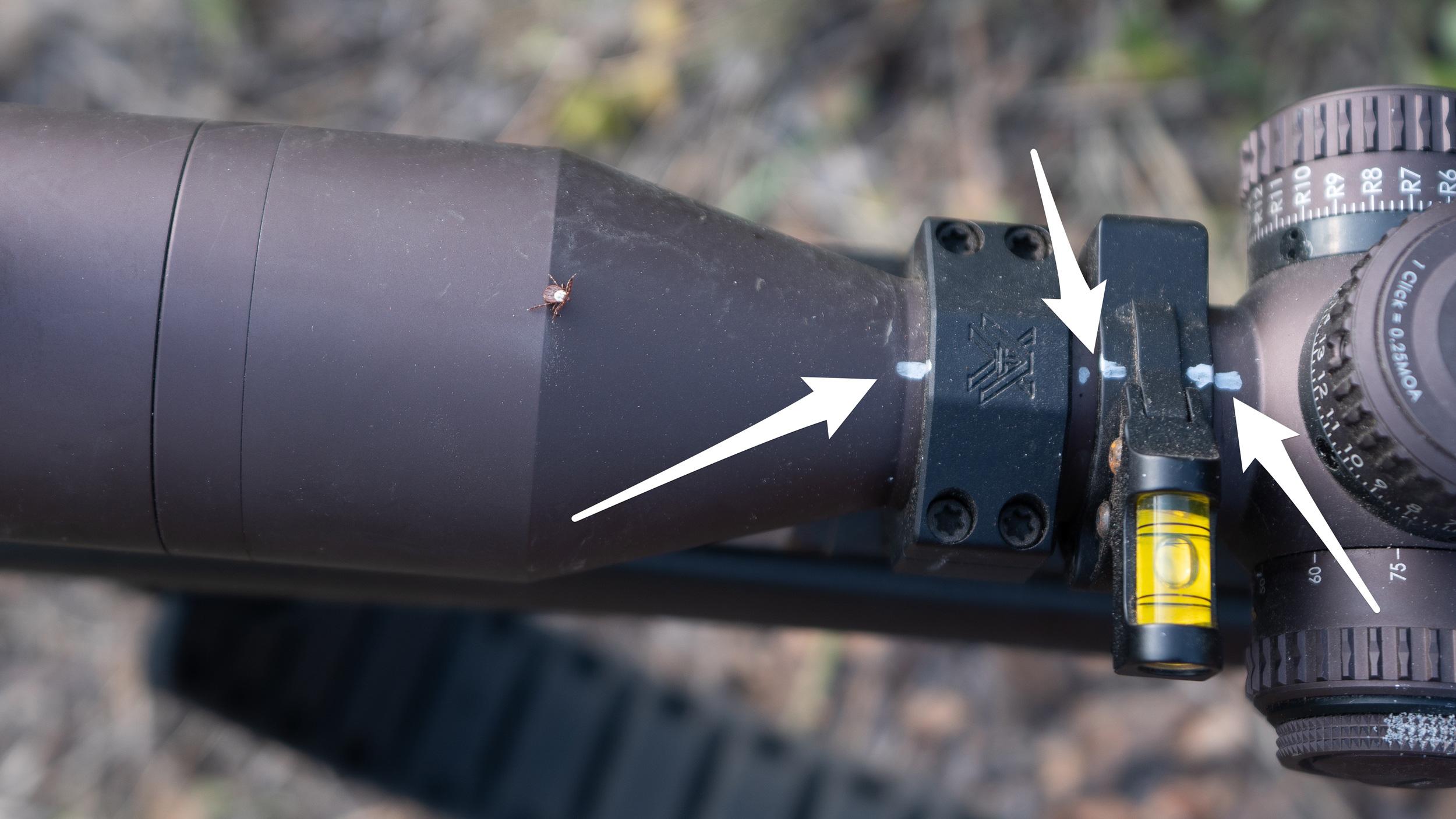 Silver Sharpie marker witness marks on riflescope
