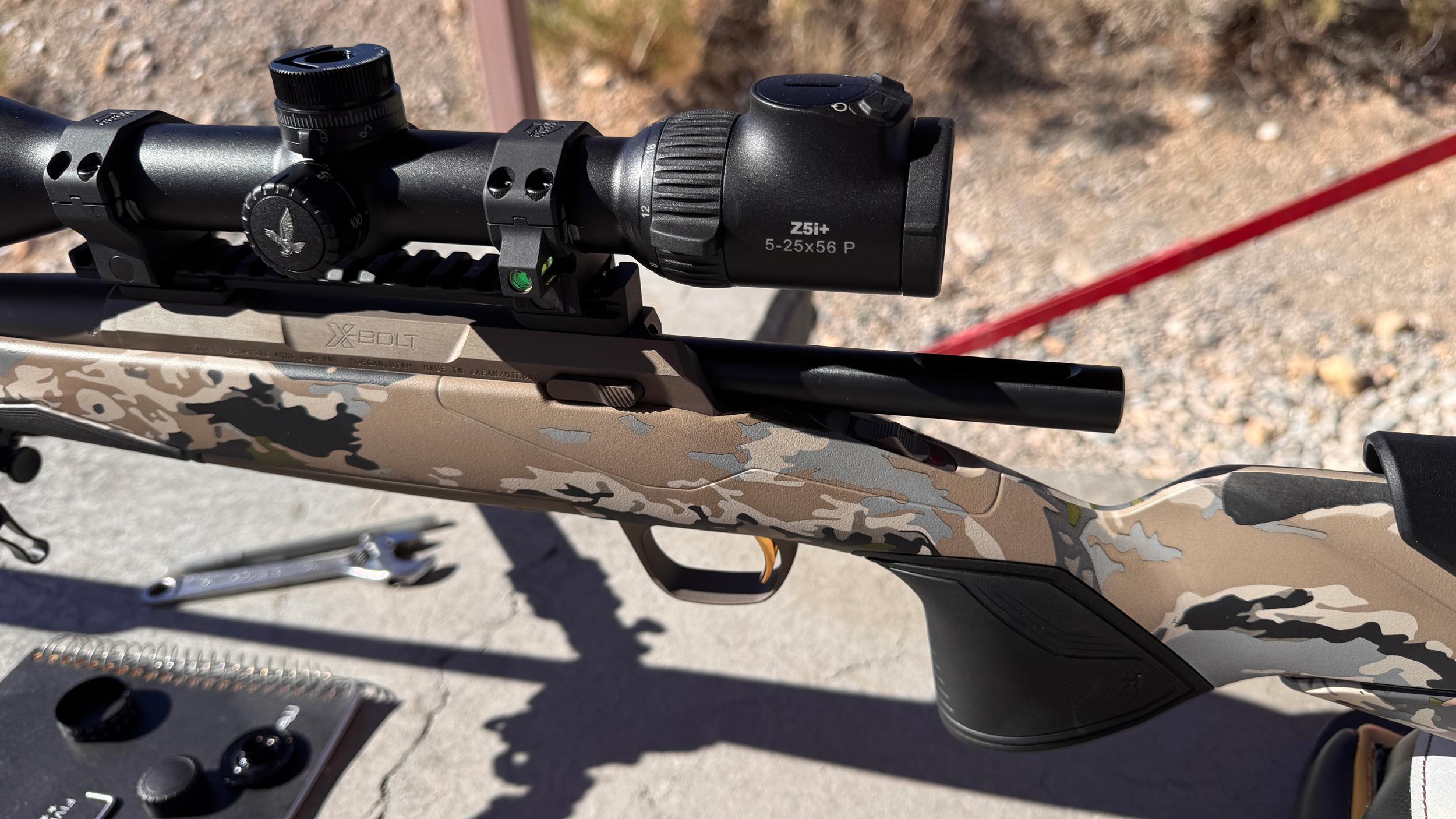 Bore guide installed to clean rifle barrel