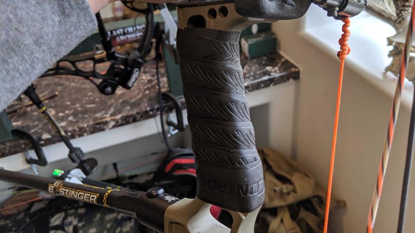 Adding wrap or tape to the bow for added grip or feel