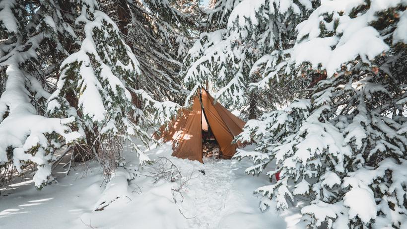 Seek outside tipi in snow