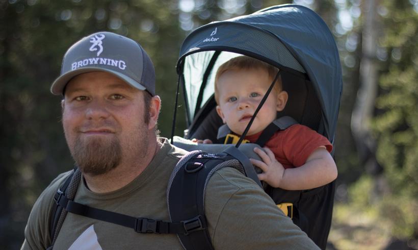 Brandon evans and his son on a scouting trip